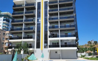 Family apartment with three bedrooms in a new building 300 meters from the sea, Mahmutlar, Alanya-id-3282-photo-1