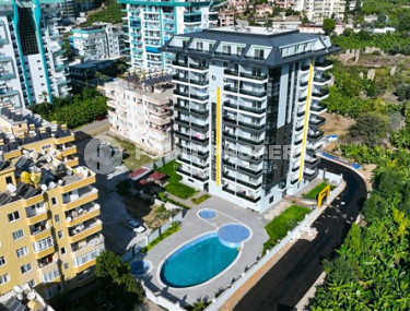 Family apartment with three bedrooms in a new building 300 meters from the sea, Mahmutlar, Alanya-id-3282-photo-3
