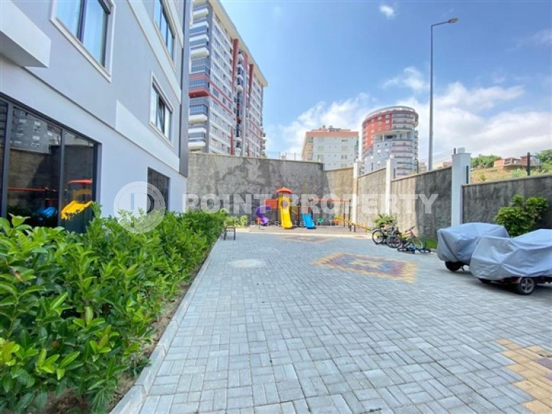 Large well-maintained 3+1 duplex with access to the terrace and sea views, Mahmutlar, Alanya-id-3285-photo-14