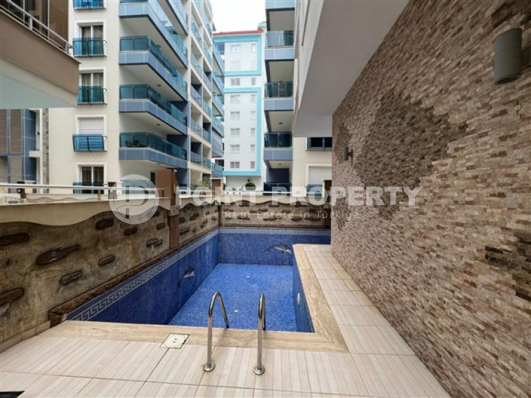 Cozy 1+1 apartment with furniture, near the sea, in the center of Mahmutlar, Alanya-id-3288-photo-11