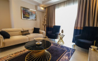 Luxurious three-room apartment 100 m2 in Mahmutlar area, Alanya, with swimming pools and water park-id-3307-photo-2
