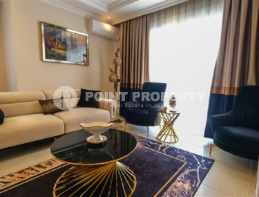 Luxurious three-room apartment 100 m2 in Mahmutlar area, Alanya, with swimming pools and water park-id-3307-photo-2