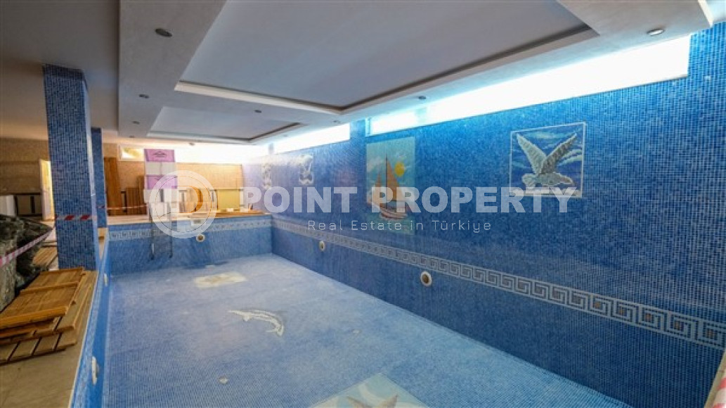 Luxurious three-room apartment 100 m2 in Mahmutlar area, Alanya, with swimming pools and water park-id-3307-photo-10