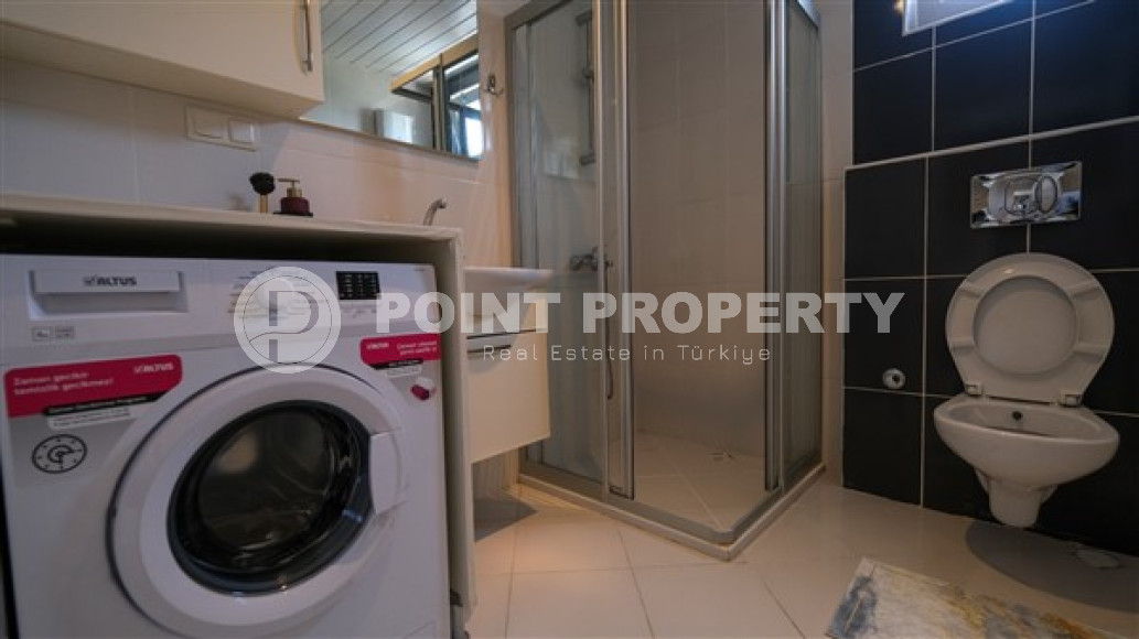 Luxurious three-room apartment 100 m2 in Mahmutlar area, Alanya, with swimming pools and water park-id-3307-photo-32