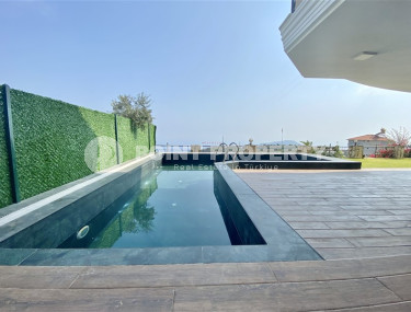 Современная вилла 4+1 в живописном районе Бекташ. Площадью 290м2.-id-1295-фото-2