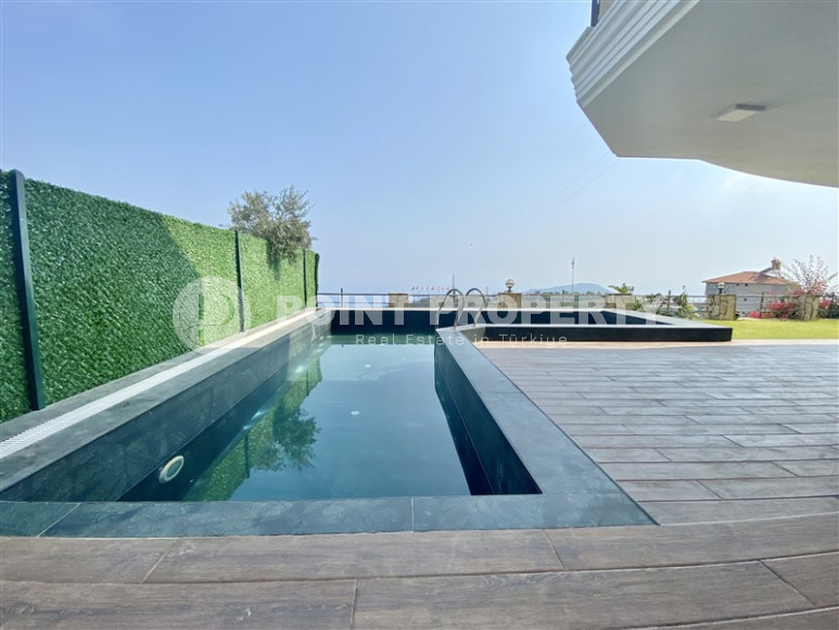 Современная вилла 4+1 в живописном районе Бекташ. Площадью 290м2.-id-1295-фото-2