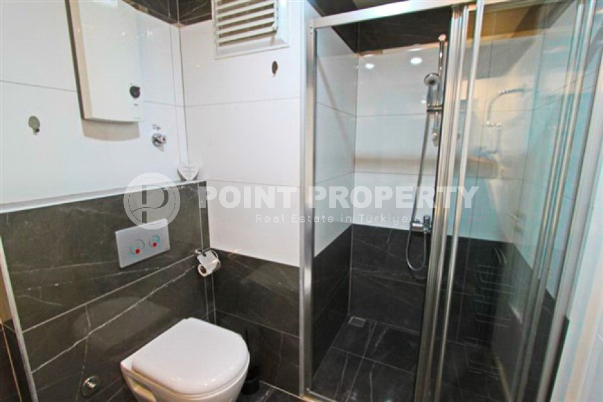 Cozy 1+1 apartment with an area of 65 m2 in the Cikcilli area, Alanya, 300 meters from the center of the area-id-3313-photo-27