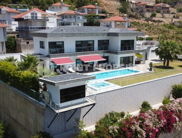 Пятикомнатная дуплексная вилла с площадью 390 м2 в районе Тепе, с мебелью и стильным интерьером-id-3317-фото-3