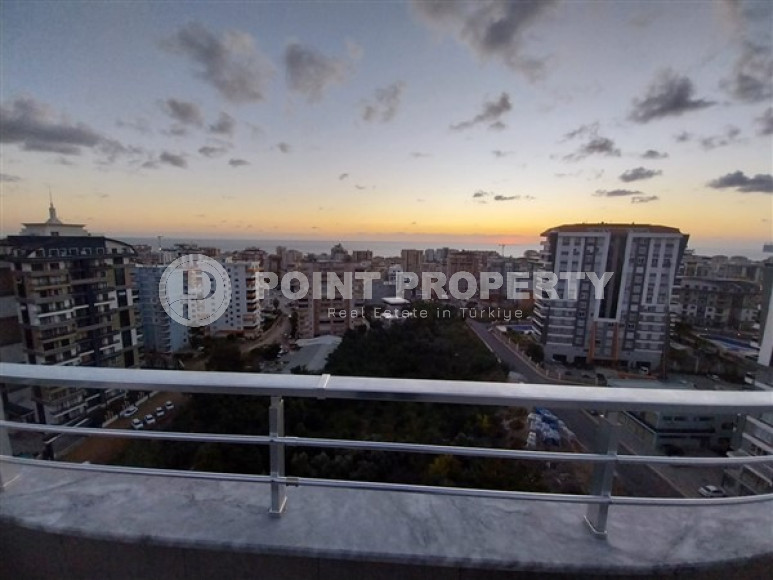 Bright two-level penthouse 4+1 with access to the terrace, Mahmutlar, Alanya-id-3318-photo-1