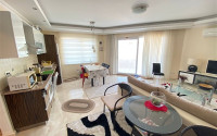 Inexpensive furnished apartment with an area of 115 m2 in Mahmutlar, Alanya-id-3320-photo-4