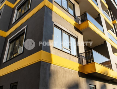 Двухкомнатные апартаменты стандартной площади 55 м² в новом доме в центре Аланьи-id-3328-фото-2