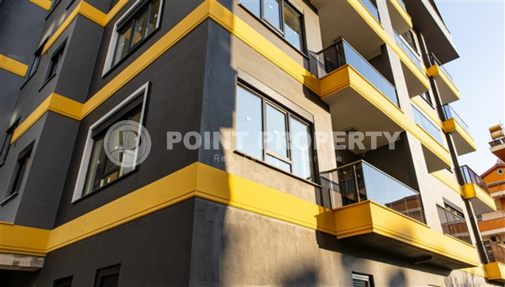 Двухкомнатные апартаменты стандартной площади 55 м² в новом доме в центре Аланьи-id-3328-фото-2