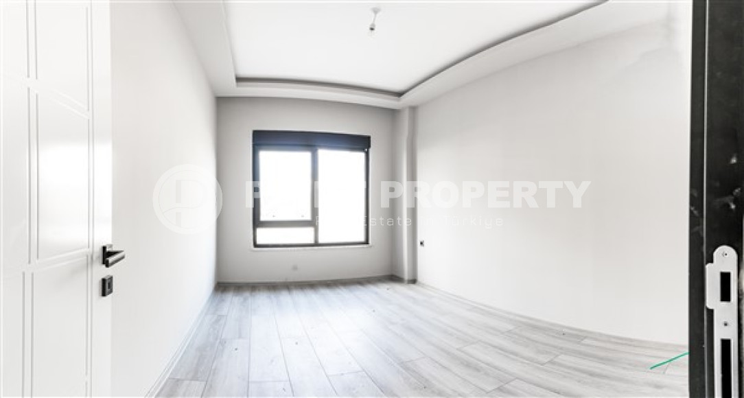 Двухкомнатные апартаменты стандартной площади 55 м² в новом доме в центре Аланьи-id-3328-фото-4