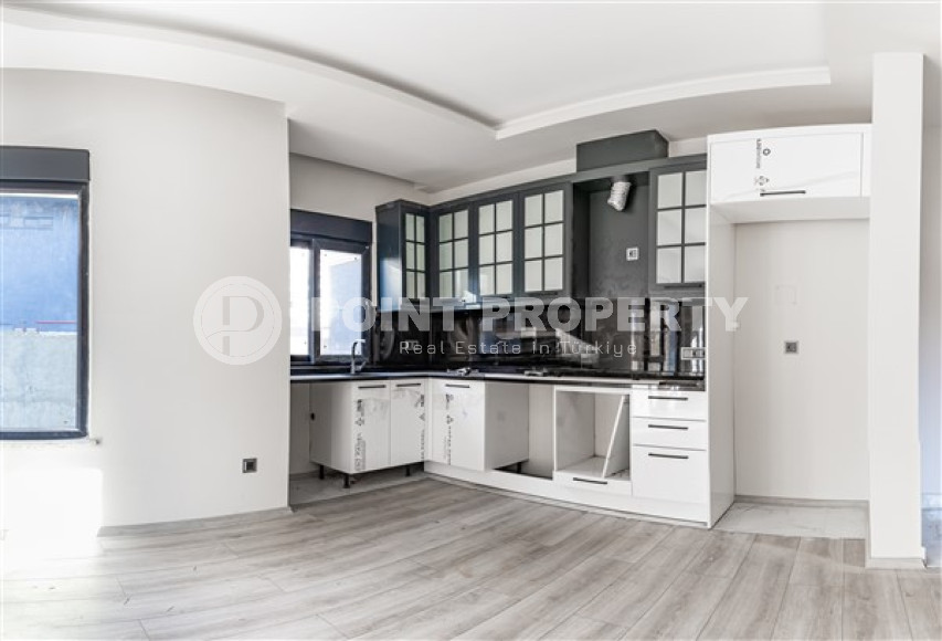 Двухкомнатные апартаменты стандартной площади 55 м² в новом доме в центре Аланьи-id-3328-фото-7