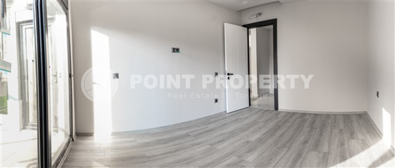 Двухкомнатные апартаменты стандартной площади 55 м² в новом доме в центре Аланьи-id-3328-фото-9