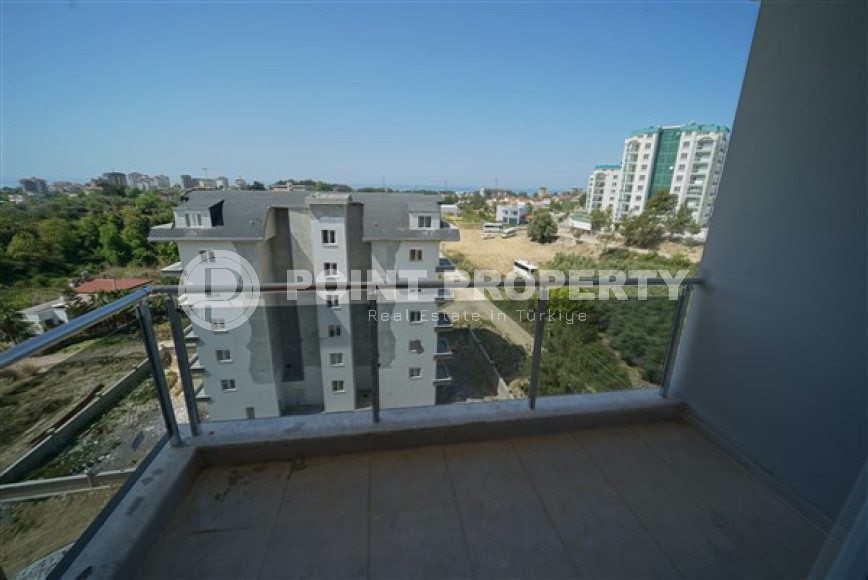 Three-room penthouse with an area of 100 m2 in a new residence, Avsallar district-id-3345-photo-2