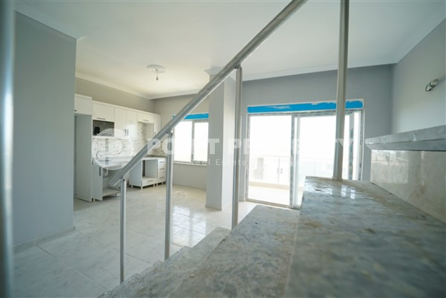 Three-room penthouse with an area of 100 m2 in a new residence, Avsallar district-id-3345-photo-5