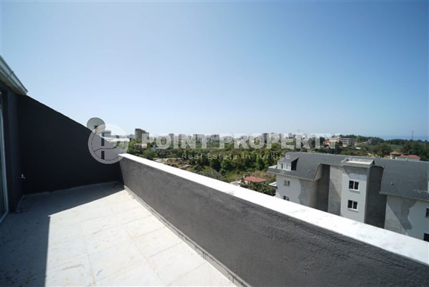 Three-room penthouse with an area of 100 m2 in a new residence, Avsallar district-id-3345-photo-11