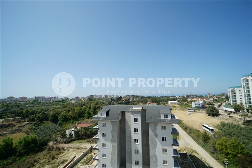 Three-room penthouse with an area of 100 m2 in a new residence, Avsallar district-id-3345-photo-12