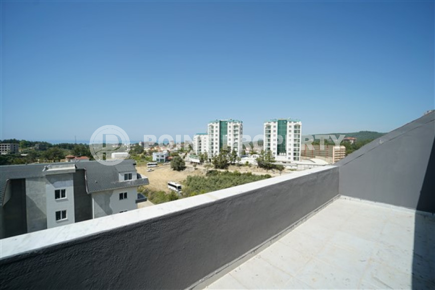 Three-room penthouse with an area of 100 m2 in a new residence, Avsallar district-id-3345-photo-13