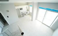 Three-room penthouse with an area of 100 m2 in a new residence, Avsallar district-id-3345-photo-18
