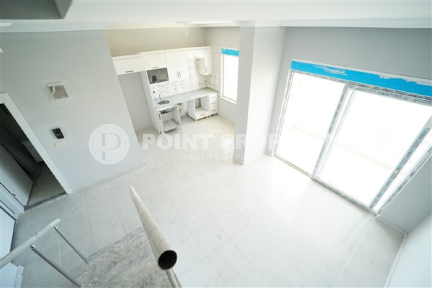 Three-room penthouse with an area of 100 m2 in a new residence, Avsallar district-id-3345-photo-18