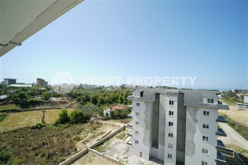 Three-room penthouse with an area of 100 m2 in a new residence, Avsallar district-id-3345-photo-19
