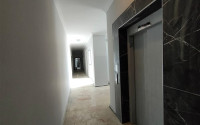 Three-room penthouse with an area of 100 m2 in a new residence, Avsallar district-id-3345-photo-21