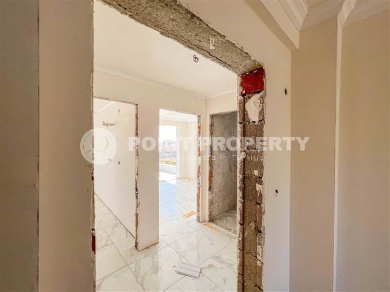 Квартира 1+1 в новом доме в Газипаша, 55 м2. Выгодное предложение.-id-1297-фото-7