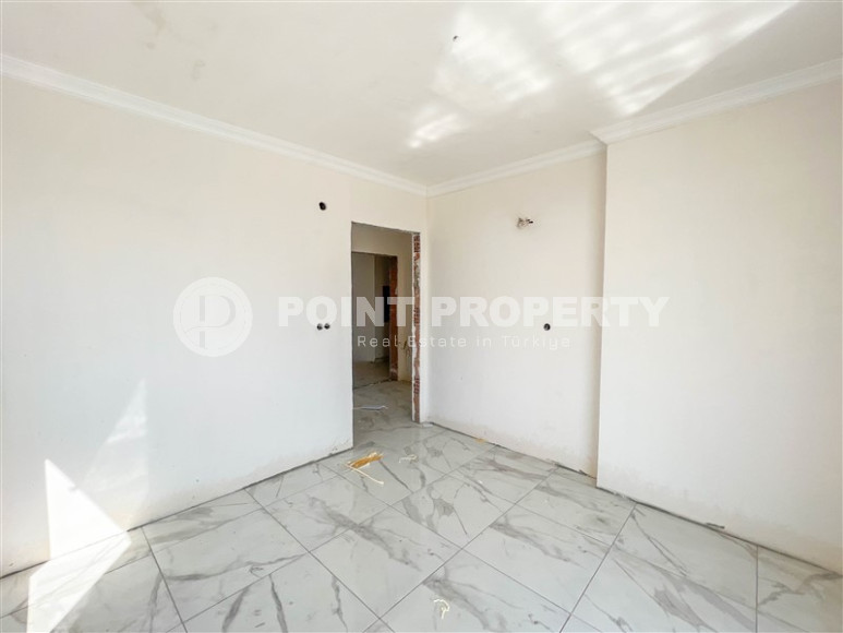 Квартира 1+1 в новом доме в Газипаша, 55 м2. Выгодное предложение.-id-1297-фото-10