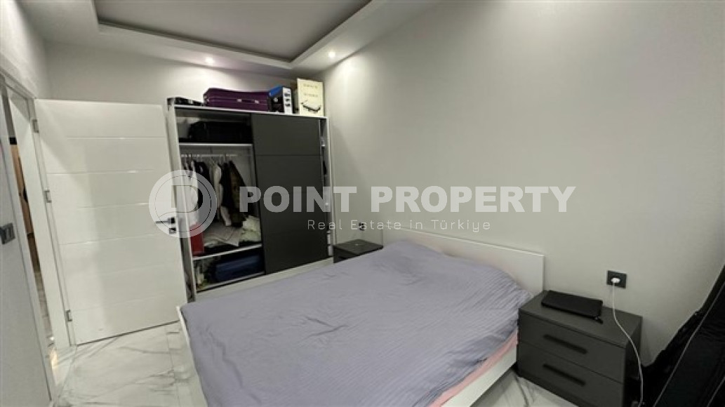 Two-room apartment with an area of 65 m2 just 400 meters from the Mediterranean Sea, Mahmutlar-id-3358-photo-3