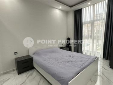 Two-room apartment with an area of 65 m2 just 400 meters from the Mediterranean Sea, Mahmutlar-id-3358-photo-4