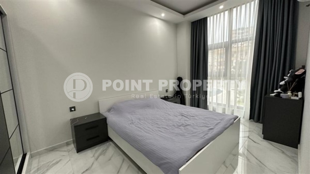 Two-room apartment with an area of 65 m2 just 400 meters from the Mediterranean Sea, Mahmutlar-id-3358-photo-4