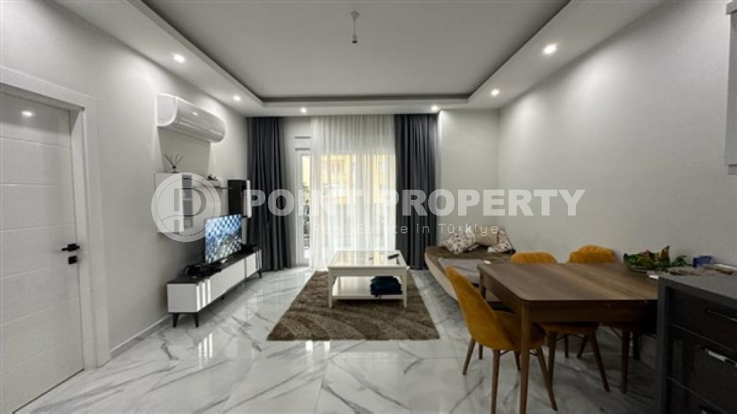 Two-room apartment with an area of 65 m2 just 400 meters from the Mediterranean Sea, Mahmutlar-id-3358-photo-5