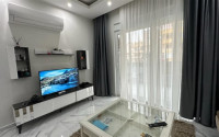 Two-room apartment with an area of 65 m2 just 400 meters from the Mediterranean Sea, Mahmutlar-id-3358-photo-6