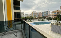 Two-room apartment with an area of 65 m2 just 400 meters from the Mediterranean Sea, Mahmutlar-id-3358-photo-8