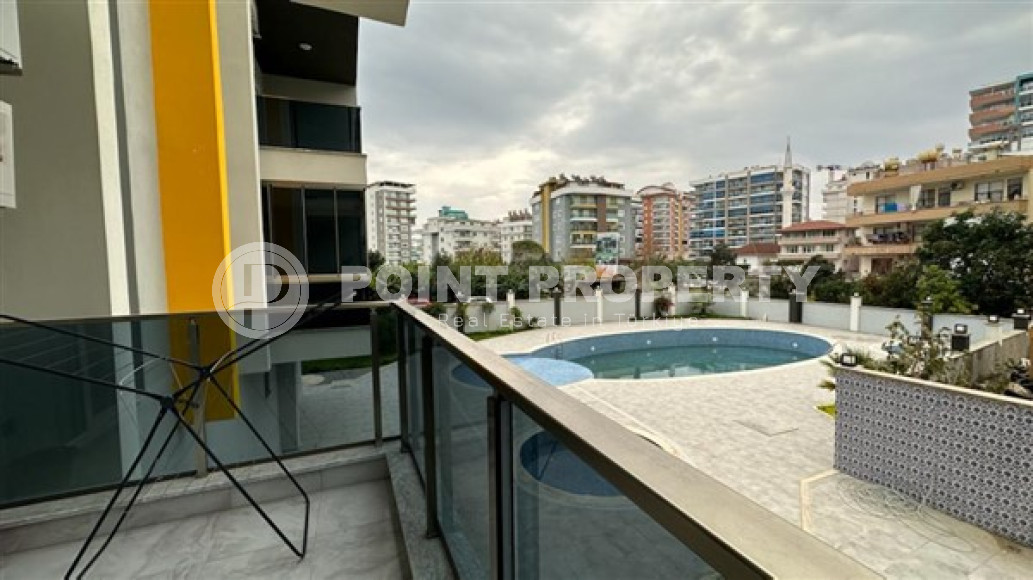 Two-room apartment with an area of 65 m2 just 400 meters from the Mediterranean Sea, Mahmutlar-id-3358-photo-8