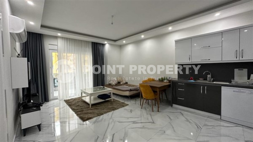 Two-room apartment with an area of 65 m2 just 400 meters from the Mediterranean Sea, Mahmutlar-id-3358-photo-10