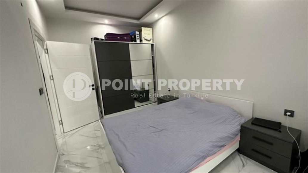 Two-room apartment with an area of 65 m2 just 400 meters from the Mediterranean Sea, Mahmutlar-id-3358-photo-11