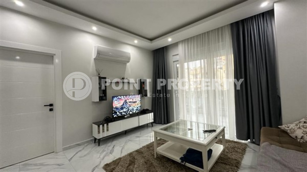 Two-room apartment with an area of 65 m2 just 400 meters from the Mediterranean Sea, Mahmutlar-id-3358-photo-13