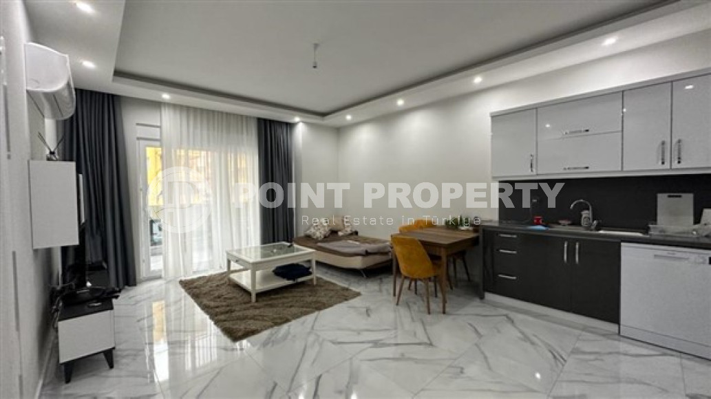 Two-room apartment with an area of 65 m2 just 400 meters from the Mediterranean Sea, Mahmutlar-id-3358-photo-14