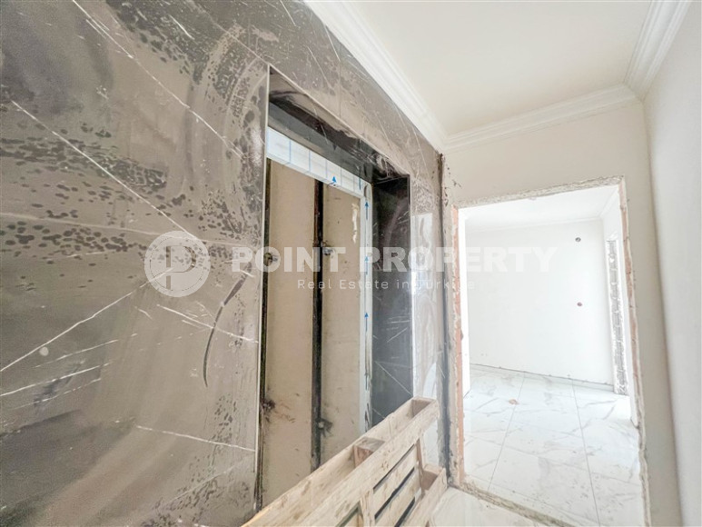 Квартира 1+1 в новом доме в Газипаша, 55 м2. Выгодное предложение.-id-1297-фото-17