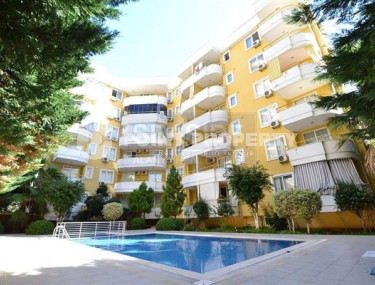 Two-room furnished apartment of 70 m² on the fifth floor of a small residential complex, Mahmutlar, Alanya-id-3361-photo-1