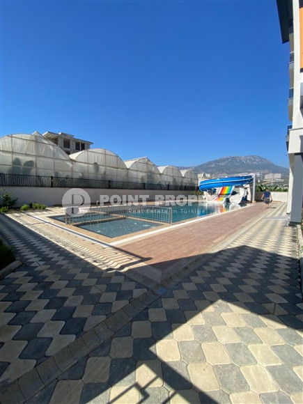 New 1+1 apartment with complete renovation in a building built in 2022 in the Kargicak area-id-3363-photo-5