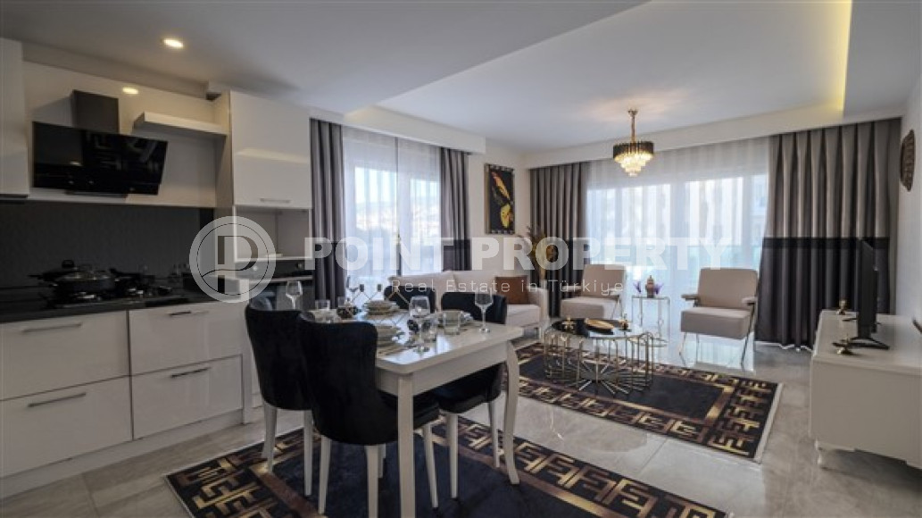 Inexpensive two-room furnished apartment with an area of 60 m2, Mahmutlar district-id-3368-photo-2