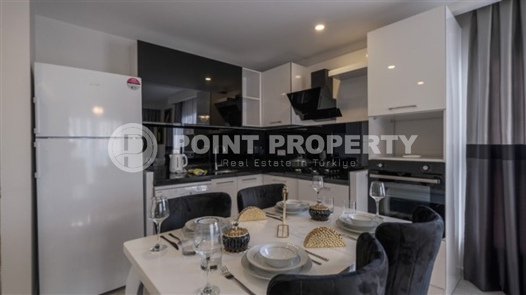 Inexpensive two-room furnished apartment with an area of 60 m2, Mahmutlar district-id-3368-photo-9