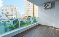 Inexpensive two-room furnished apartment with an area of 60 m2, Mahmutlar district-id-3368-photo-18