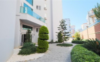 Inexpensive two-room furnished apartment with an area of 60 m2, Mahmutlar district-id-3368-photo-22