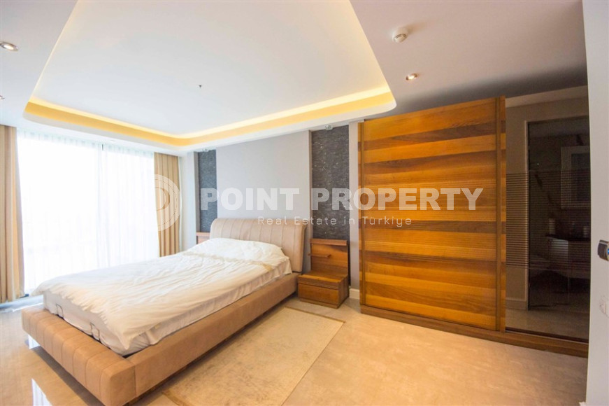 Апартаменты 2+1 с потрясающим видом на Средиземное море в комплексе Премиум класса в районе Конаклы, 156 м2.-id-1299-фото-9