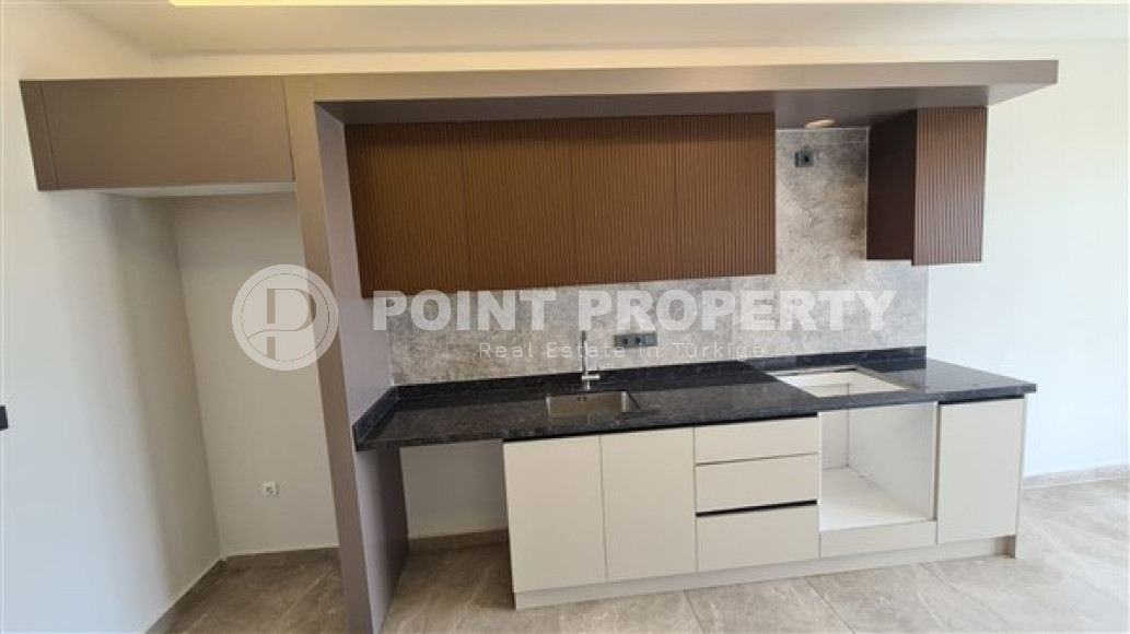 Просторная трёхкомнатная квартира с отдельной кухней в новом доме верхней Обы, Аланья-id-3375-фото-9